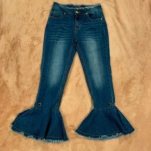 Flared out blue jeans